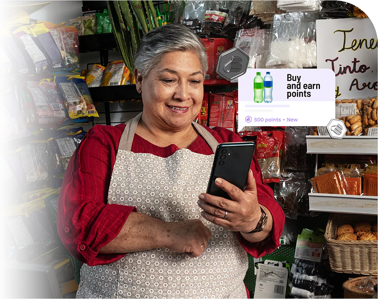 A woman using her phone to look at products.