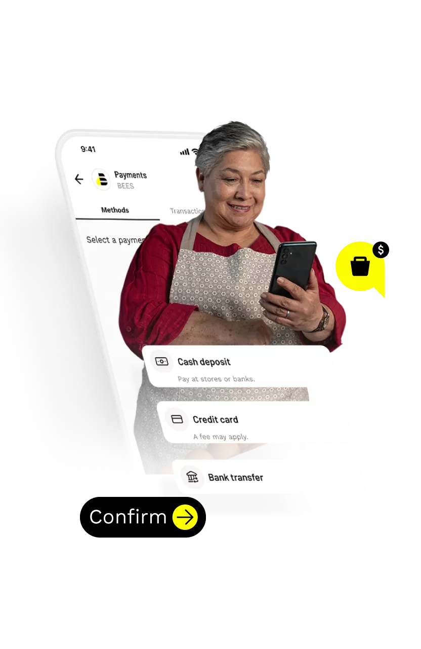 A woman using BEES pay.